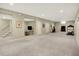 Spacious finished basement offers an open layout suitable for various activities at 1411 N Claridge Way, Carmel, IN 46032