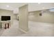 Wide open basement featuring neutral paint, carpet, and partial wall in open layout at 1411 N Claridge Way, Carmel, IN 46032