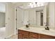 Bright bathroom featuring dual sinks, ample counter space, and neutral walls at 1411 N Claridge Way, Carmel, IN 46032