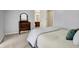 Comfortable bedroom includes a dresser and an ensuite bathroom at 1411 N Claridge Way, Carmel, IN 46032