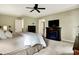 Spacious main bedroom featuring soft carpet, a fireplace, and a closet at 1411 N Claridge Way, Carmel, IN 46032