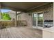 A covered back deck with brick pillars provides a relaxing outdoor space for entertaining at 16548 Grand Cypress Dr, Noblesville, IN 46060