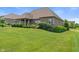 Spacious backyard offers well-maintained landscaping and a tranquil setting for outdoor activities at 16548 Grand Cypress Dr, Noblesville, IN 46060