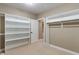 Well-organized walk-in closet with shelves and a rod for lots of storage at 16548 Grand Cypress Dr, Noblesville, IN 46060