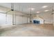Large garage offering multiple parking spaces with access to the upper level of the house at 16548 Grand Cypress Dr, Noblesville, IN 46060