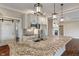 Kitchen featuring stainless steel appliances, granite counters, and white cabinetry at 16548 Grand Cypress Dr, Noblesville, IN 46060