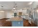 Kitchen with granite counters, white cabinets, and stainless steel appliances at 16548 Grand Cypress Dr, Noblesville, IN 46060