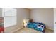 Cozy bedroom with carpet, a single bed, and window with natural light at 16551 Branham Dr, Fishers, IN 46040