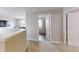 Open hallway with views to living room, bedrooms, and storage at 16551 Branham Dr, Fishers, IN 46040