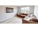 Comfortable and cozy living room with large windows and a flat screen television at 16551 Branham Dr, Fishers, IN 46040
