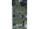 Aerial view of the property showing the home and surrounding yard at 2021 Columbia Ave, Indianapolis, IN 46202