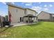 Backyard with patio, gazebo, and lush green lawn at 2078 Seneca Ln, Plainfield, IN 46168