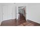 Bedroom with hardwood floors, large closet, and a view to a large window at 2078 Seneca Ln, Plainfield, IN 46168
