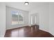 Bright room with hardwood floors and a large window, perfect for an office at 2078 Seneca Ln, Plainfield, IN 46168