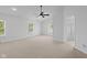 This spacious main bedroom boasts plush carpet, neutral walls, and ensuite bathroom at 2078 Seneca Ln, Plainfield, IN 46168