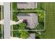 Aerial view of a home showing roof and landscaping, framed by a bright blue sky at 3545 Inverness Blvd, Carmel, IN 46032