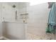 Modern walk-in shower with glass door, granite bench, and tiled walls with built-in niche; spa-like bathroom at 3545 Inverness Blvd, Carmel, IN 46032