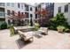 Relaxing courtyard with seating, a water feature, and landscaped surroundings, offering a serene outdoor space at 355 E Ohio St # 211, Indianapolis, IN 46204