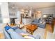 Open living room and kitchen featuring hardwood floors and modern decor at 355 E Ohio St # 211, Indianapolis, IN 46204