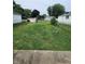 Fenced backyard featuring grass and a shed at 408 W 4Th St, Anderson, IN 46016