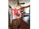 Cozy eat-in kitchen featuring wooden cabinetry, laminate countertops, and a gas range oven at 408 W 4Th St, Anderson, IN 46016