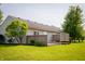 Wooden deck featuring wood lattice railing overlooking a lush backyard at 4114 Dunedin Ct, Noblesville, IN 46062