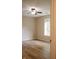Comfortable bedroom featuring a ceiling fan and a bright window with wood floors at 4114 Dunedin Ct, Noblesville, IN 46062