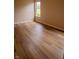 Cozy bedroom featuring laminate flooring and ample natural light at 4114 Dunedin Ct, Noblesville, IN 46062