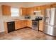 Well-equipped kitchen featuring stainless steel appliances and a functional layout at 4114 Dunedin Ct, Noblesville, IN 46062