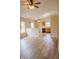 Open-concept living room flows into the kitchen with updated appliances and ample natural light at 4114 Dunedin Ct, Noblesville, IN 46062
