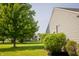 Side yard view showcasing the home's exterior and well-maintained landscaping at 4114 Dunedin Ct, Noblesville, IN 46062