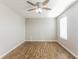 Bright bedroom featuring hardwood floors, natural light and a modern ceiling fan at 413 Youngs Creek Ct, Franklin, IN 46131