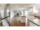Bright, modern kitchen featuring an island, stainless appliances, and sleek countertops at 413 Youngs Creek Ct, Franklin, IN 46131