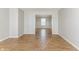 Bright and spacious living room featuring hardwood floors and neutral paint at 413 Youngs Creek Ct, Franklin, IN 46131