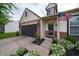 Charming home with a well-maintained lawn and manicured front garden at 4238 Victory Ct, Indianapolis, IN 46203