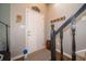 Inviting foyer with wood-look flooring, coat rack and charming decor at 4238 Victory Ct, Indianapolis, IN 46203