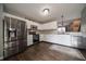 Bright kitchen with stainless steel appliances, white cabinets, and lots of counter space at 4238 Victory Ct, Indianapolis, IN 46203