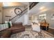 Open concept living area with a staircase, lots of seating and fireplace at 4238 Victory Ct, Indianapolis, IN 46203