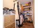 Spacious walk-in closet with custom shelving and organized storage solutions for clothing and accessories at 4238 Victory Ct, Indianapolis, IN 46203