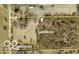 This aerial view showcases a large plot of land, ripe with potential for development or a private estate at 4633 S County Road 500 E, Plainfield, IN 46168