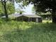 Charming single-story home featuring an unfinished front yard at 4633 S County Road 500 E, Plainfield, IN 46168
