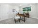 Comfortable home office with a wooden desk, stylish chair, and natural light from the window at 5205 Staughton Dr, Indianapolis, IN 46226