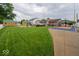 Well-maintained backyard features a basketball court, patio, shed and outdoor kitchen at 524 W Campbell St, Edinburgh, IN 46124