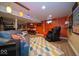 Finished basement featuring a wet bar, colorful decor and a cozy seating area at 524 W Campbell St, Edinburgh, IN 46124