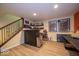Basement bar area features a custom bar, display shelves, and stairs at 524 W Campbell St, Edinburgh, IN 46124