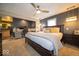 Inviting bedroom with a ceiling fan, a modern color palette, and ample natural light for relaxation and style at 524 W Campbell St, Edinburgh, IN 46124