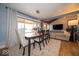 Cozy dining room with ample lighting and a view of the backyard at 524 W Campbell St, Edinburgh, IN 46124