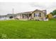 Single-story home with a spacious front lawn and inviting curb appeal at 524 W Campbell St, Edinburgh, IN 46124