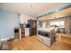 Modern kitchen with an island, stainless steel appliances, and hardwood floors, blending style and functionality at 524 W Campbell St, Edinburgh, IN 46124