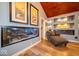 Relaxing sitting area with a large aquarium and built-in fireplace at 524 W Campbell St, Edinburgh, IN 46124